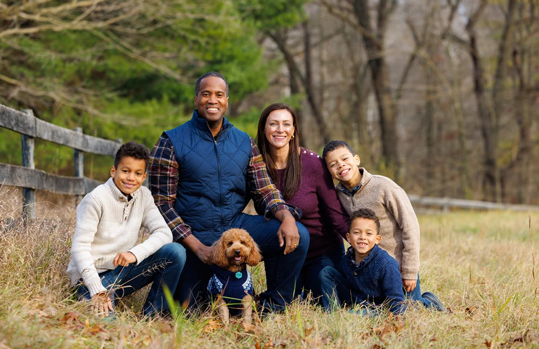 John James with his wife Elizabeth, their three sons, and the family dog