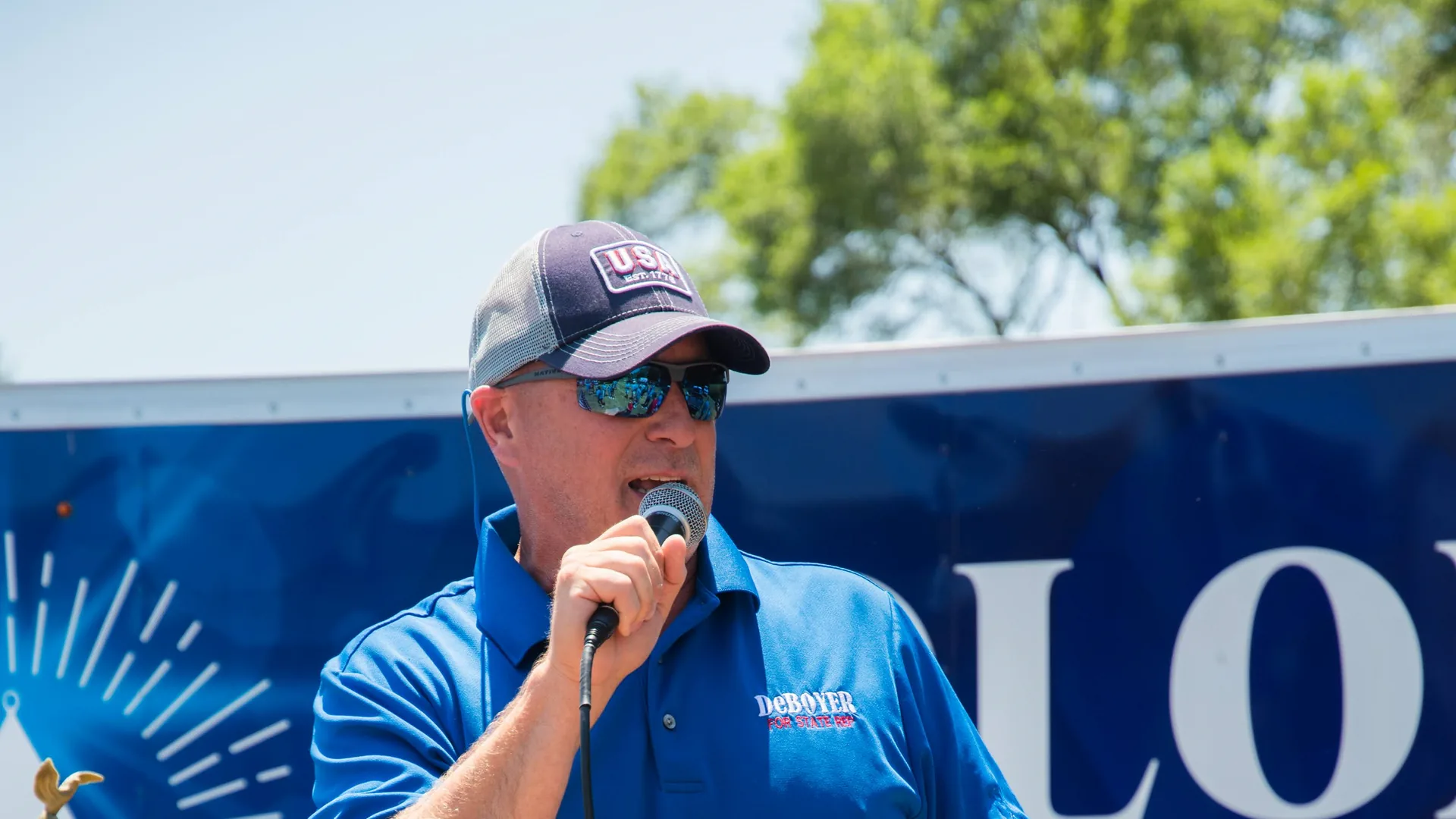 Jay DeBoyer speaking at a campaign event
